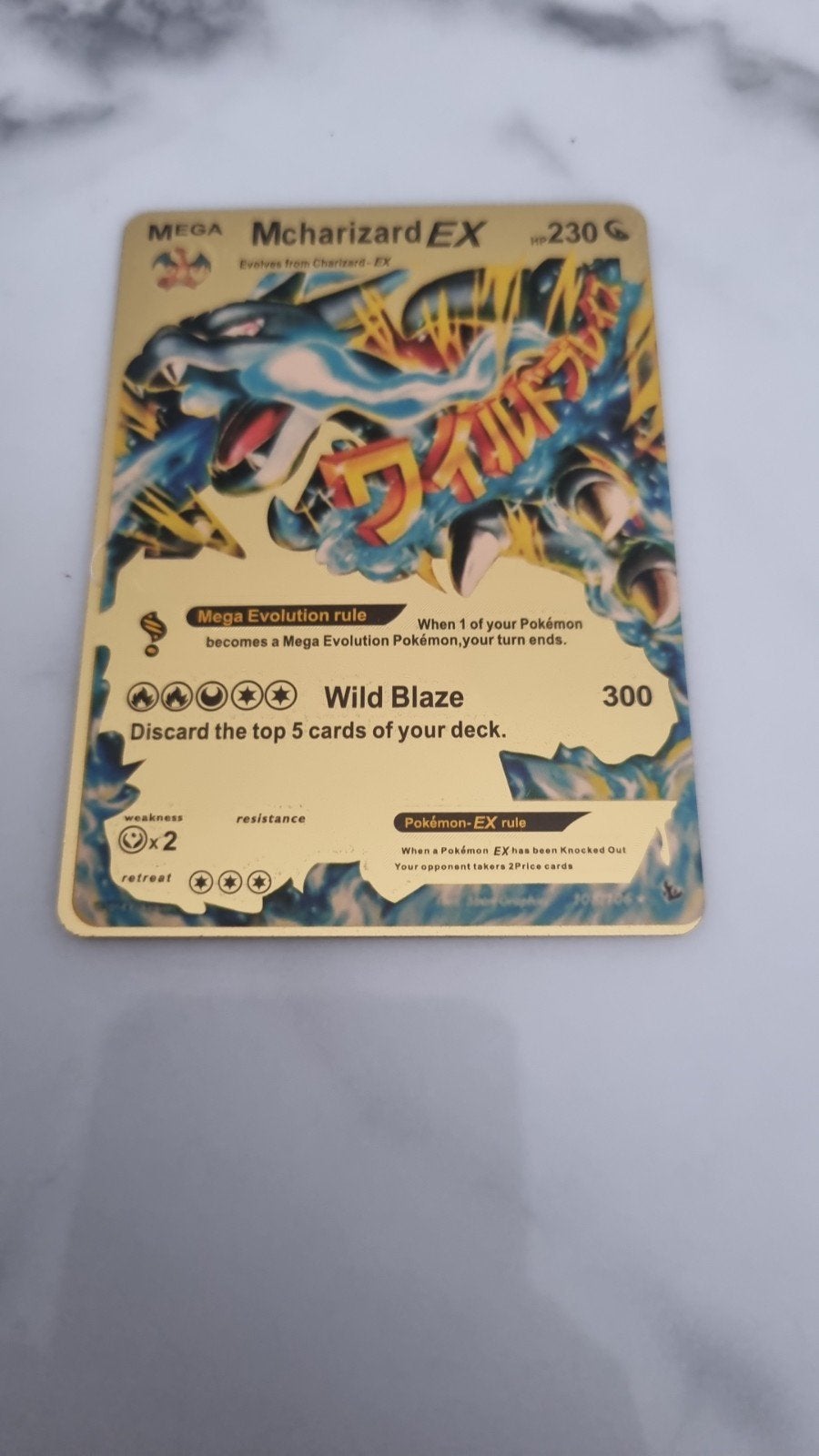 MEGA M Charizard EX (Fake) - Gouden Pokémon Kaart, Hobby en Vrije tijd, Ophalen of Verzenden, Gebruikt, Losse kaart