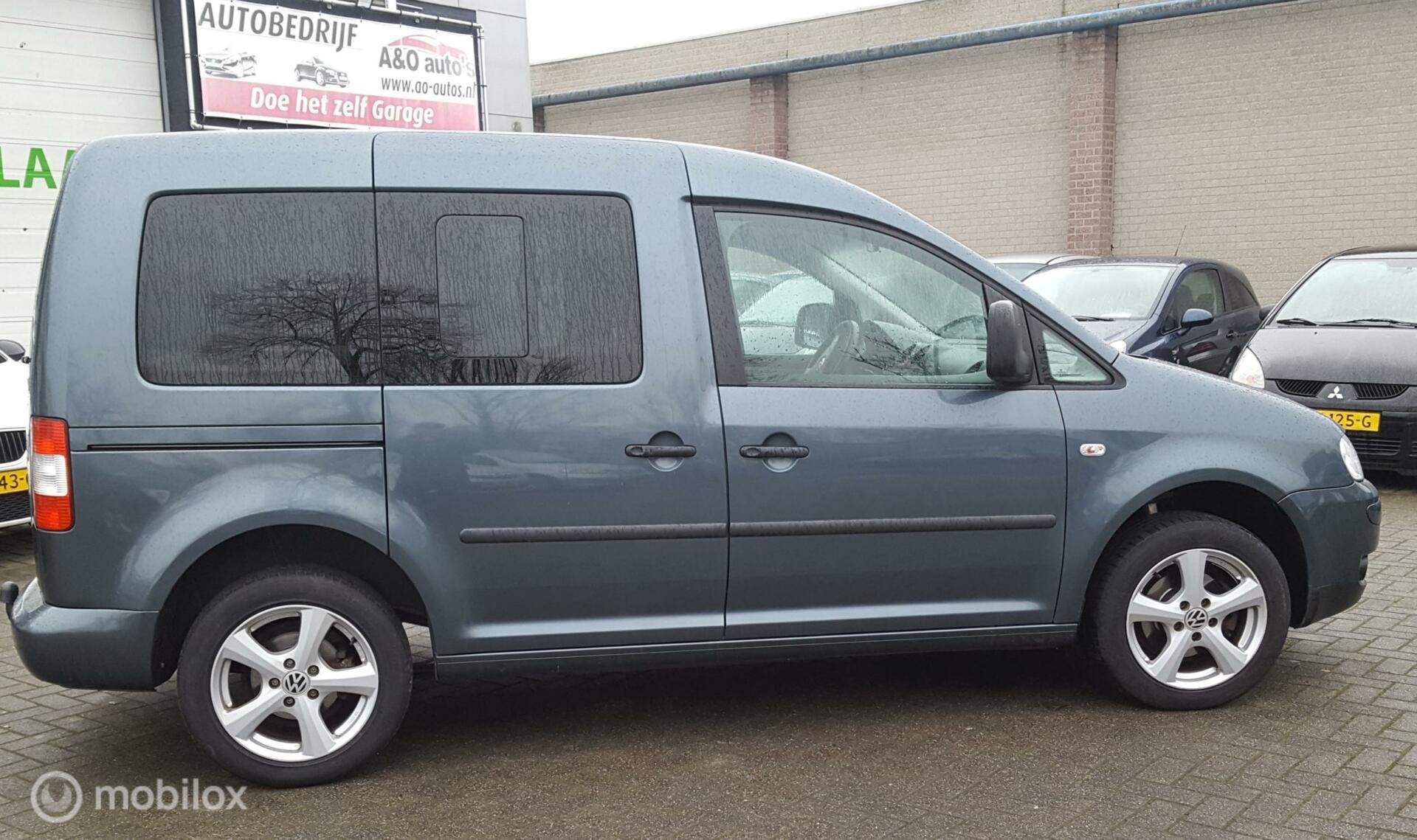 Volkswagen Caddy Combi 1.4 Comfortline 5 ZP., Auto's, Gebruikt, 1288 kg, Verwarmde buitenspiegels, Euro 4