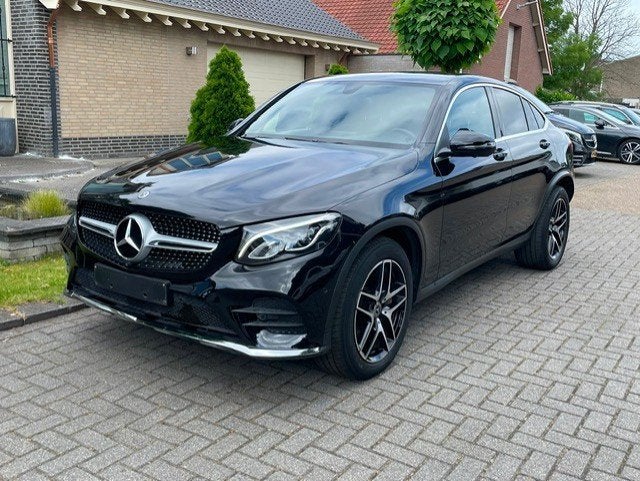 Mercedes-Benz GLC-klasse Coupé 250 d 4MATIC AMG LINE CAMERA, Auto's, Automaat, Gebruikt, Leder en Stof, Zwart