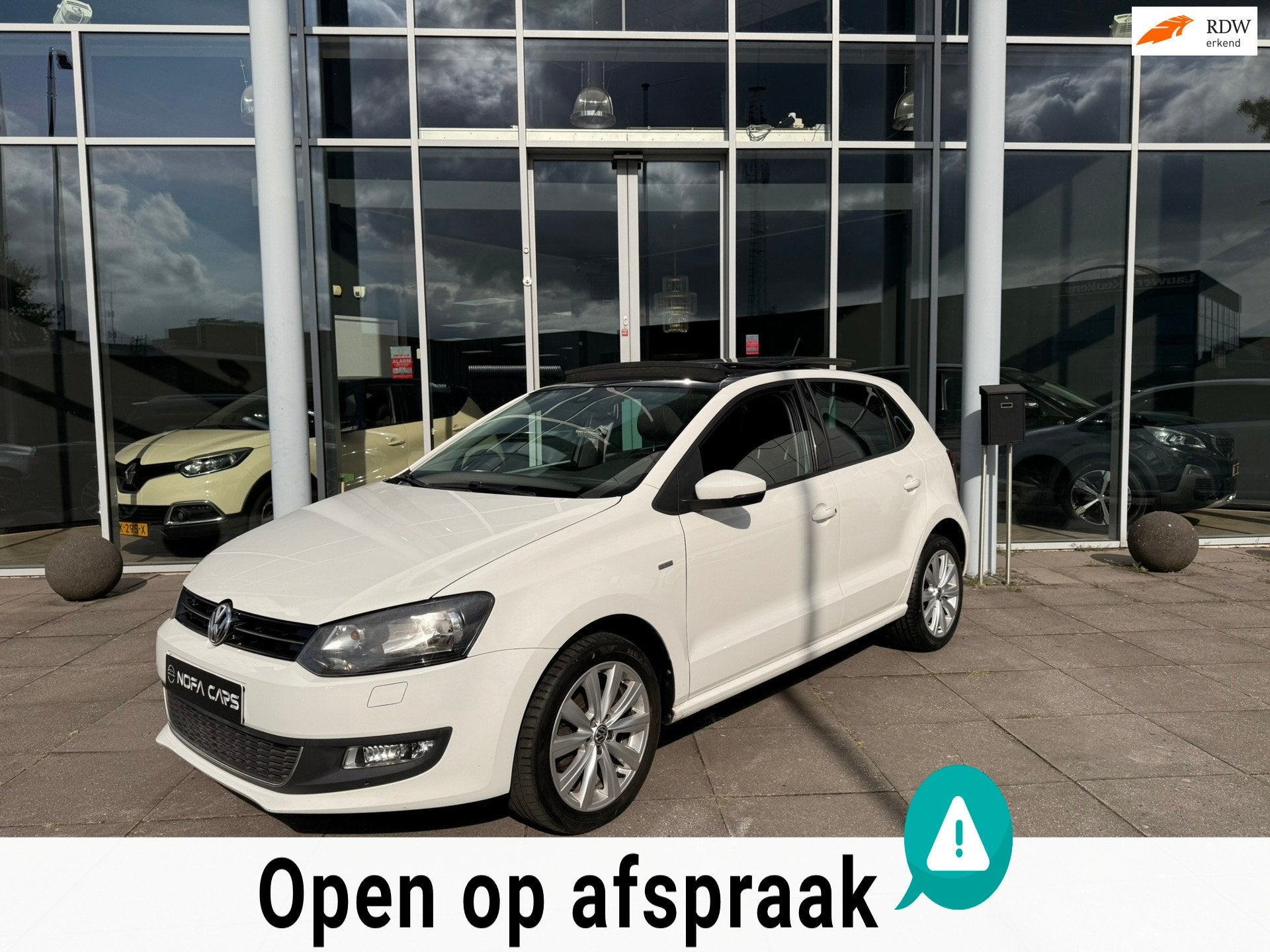Volkswagen Polo 1.2 TSI Highline, Stof, Gebruikt, Zwart, 60 pk