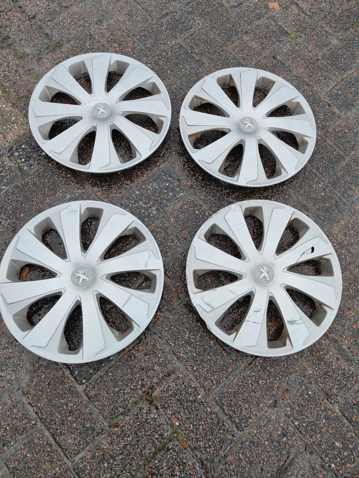Set van 4 Peugeot wieldoppen 14 inch, Ophalen, Gebruikt
