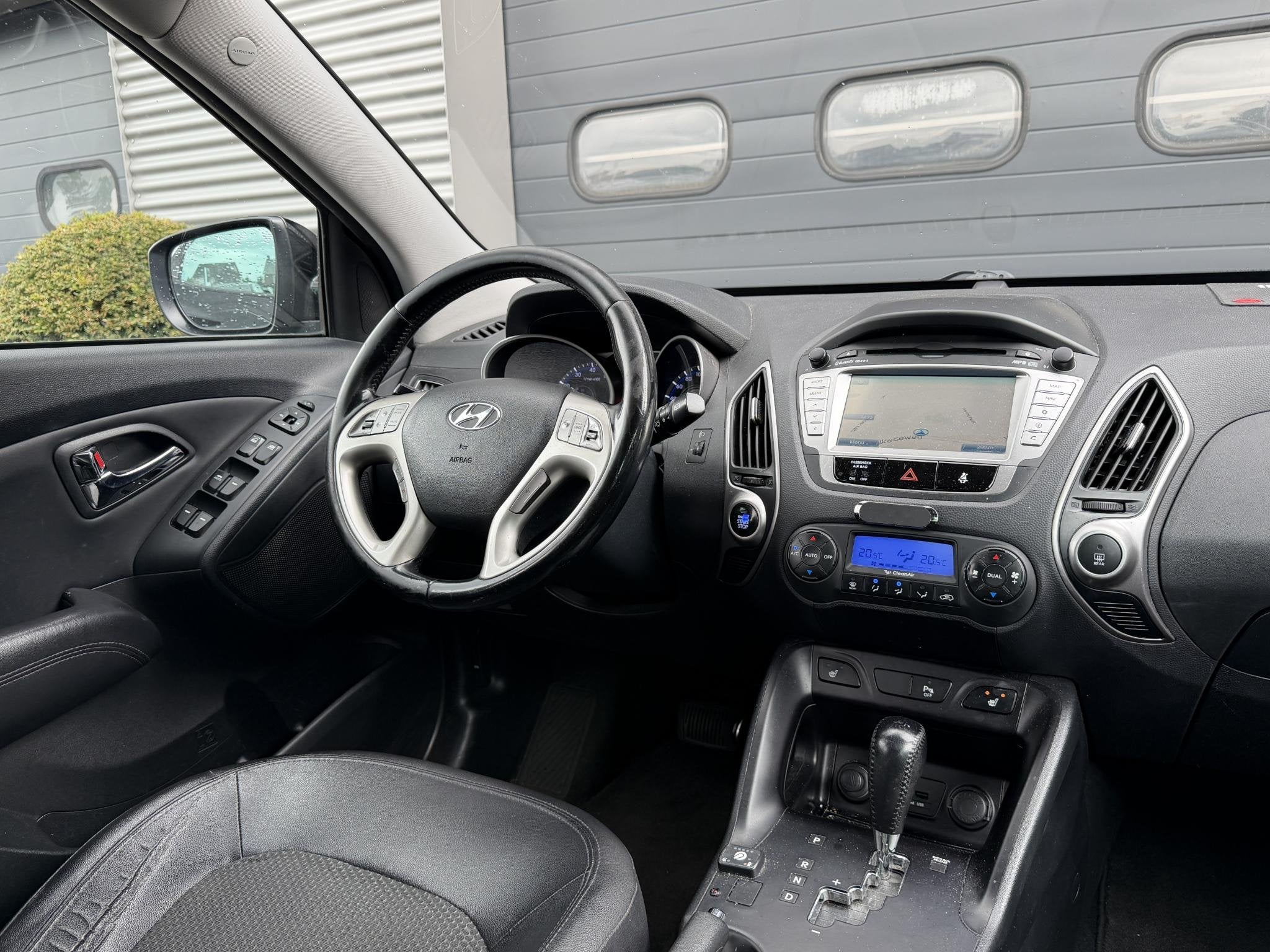 Hyundai ix35 2.0i 4WD i-Catcher | Camera | Navigatie | Clima, Auto's, Automaat, 1502 kg, Gebruikt, Leder
