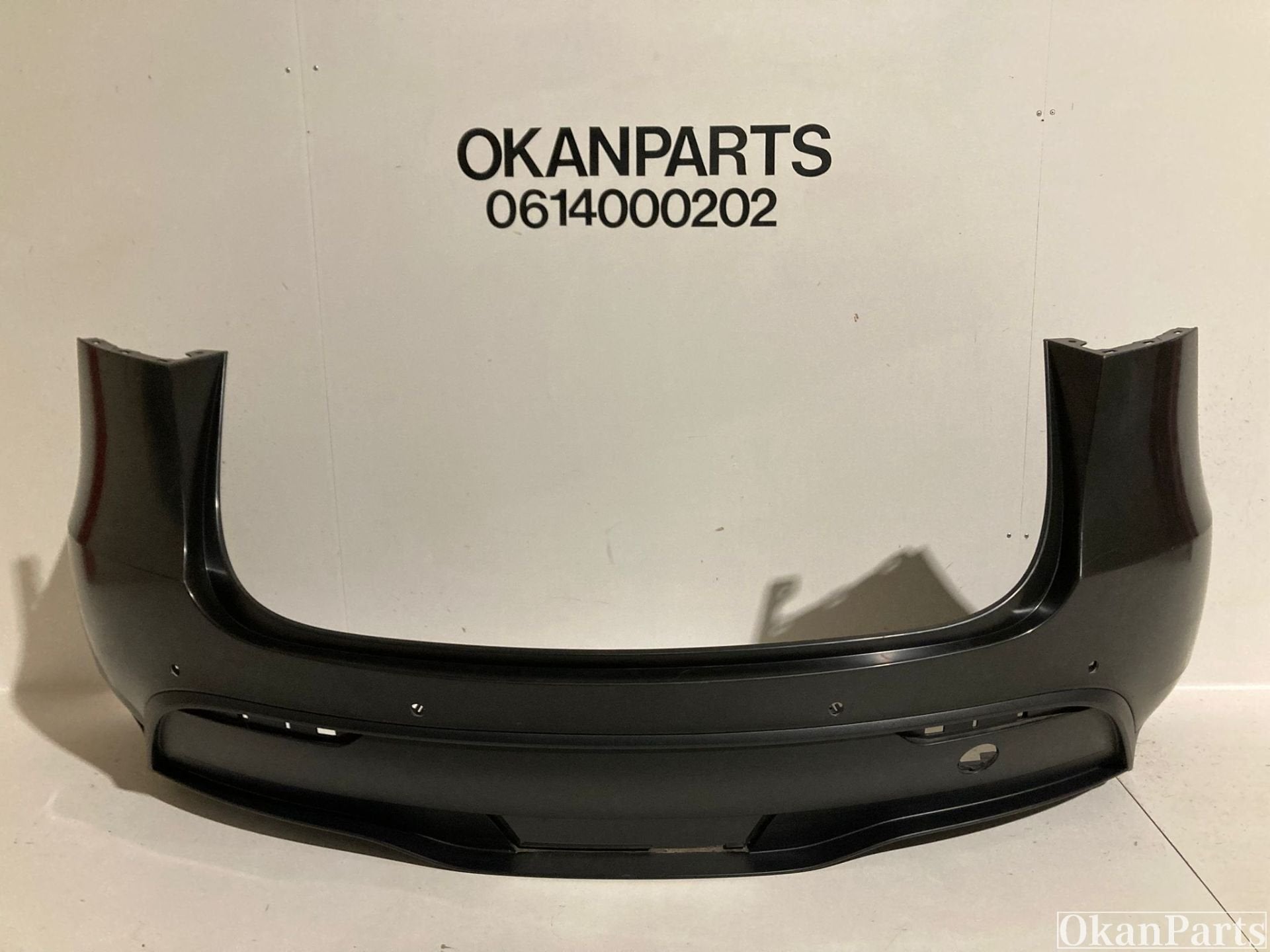 Tesla Model Y achterbumper 1494005-00-B, Ophalen of Verzenden, Gebruikt, Achter, Bumper