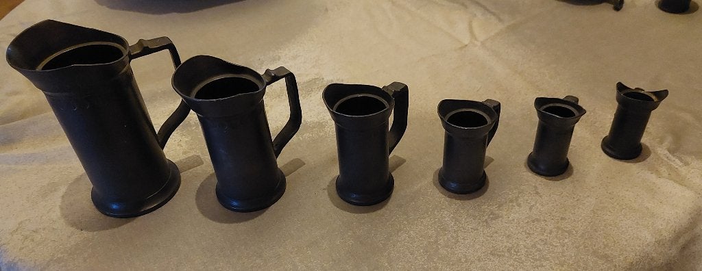 Tinnen maatbekertjes set van 6, Ophalen