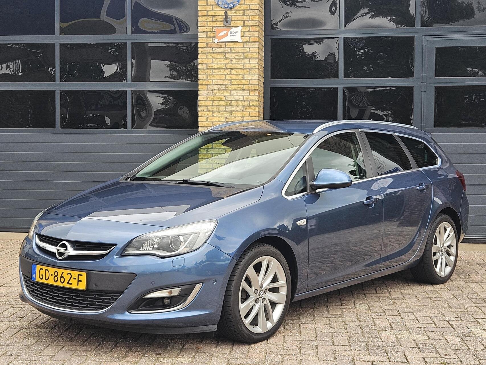 Opel Astra Sports Tourer 1.4 Turbo Sport+ | Xenon | Leder |, Auto's, Opel, Voorwielaandrijving, Automatische klimaatregeling, Gebruikt