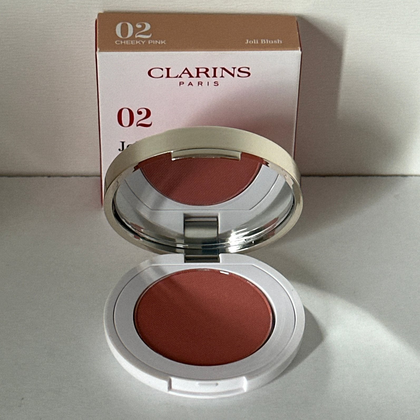 Clarins Joli Blush Mini #02 Cheeky Pink#, Ophalen of Verzenden, Nieuw, Wangen, Make-up
