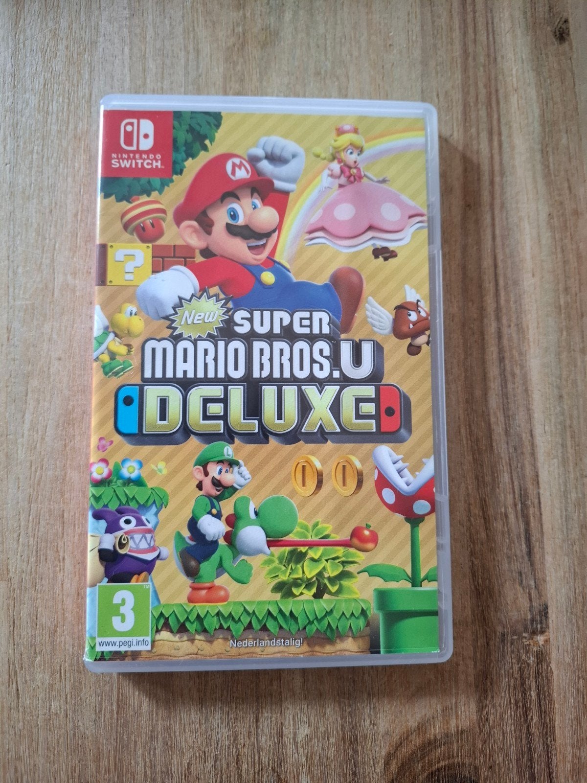 New Super Mario Bros. U Deluxe - Nintendo Switch, Spelcomputers en Games, Eén computer, Ophalen of Verzenden, Zo goed als nieuw