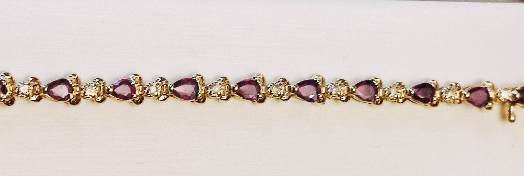 Gouden armband met natuurlijke robijnen en diamanten, Ophalen of Verzenden, Zo goed als nieuw, Met edelsteen, Goud