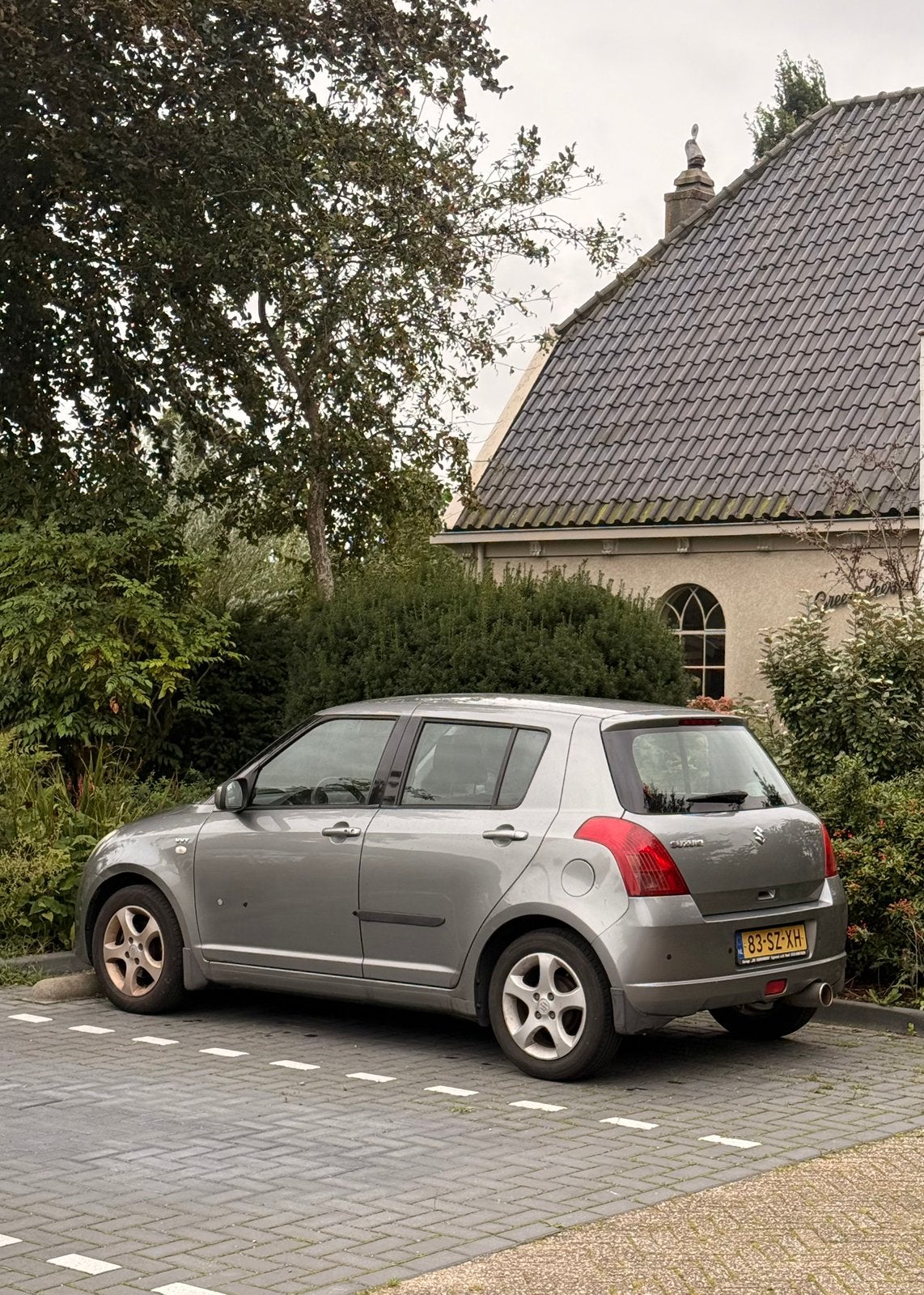 Suzuki Swift 1.5 5D 2006 Grijs APK 15 September 2027, Auto's, Voorwielaandrijving, 40 €/maand, 4 cilinders, 400 kg