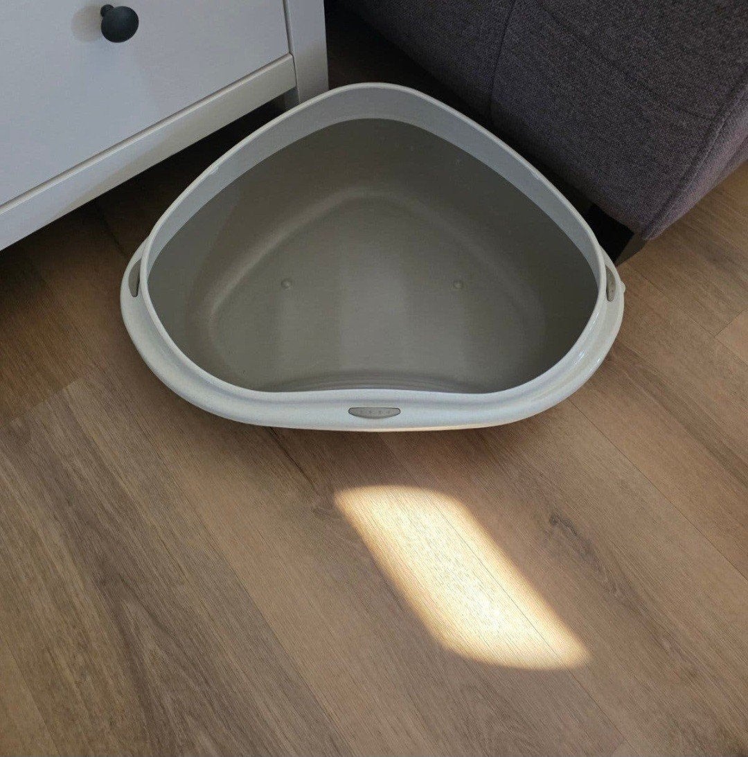 kattenbak hoek, Ophalen