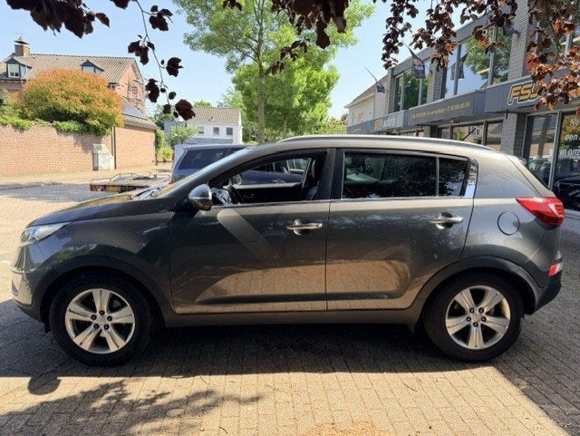 Kia Sportage 1.6 GDI X-ecutive Plus Pack / KOPPELING SLECHT, Auto's, Kia, Voorwielaandrijving, Euro 5, 135 pk, Leder en Stof