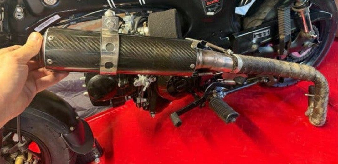 carbon rvs uitlaat Honda dax skyteam, Ophalen of Verzenden, Zo goed als nieuw, Uitlaat