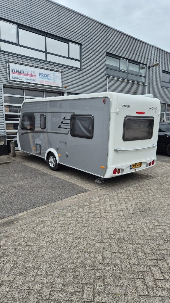 Eriba Nova Light 446 (Alko mover, luifel, Dorema voortent), Caravans en Kamperen, Rondzit, Bedrijf, Kachel, 6 tot 7 meter