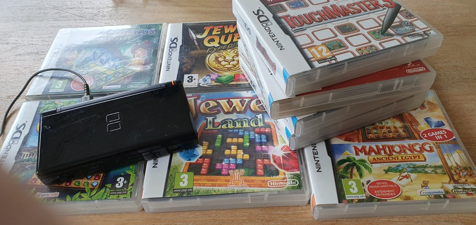 Nintendo DS Lite Zwart met 10 spellen en oplader, Spelcomputers en Games, Games | Nintendo DS, Ophalen of Verzenden