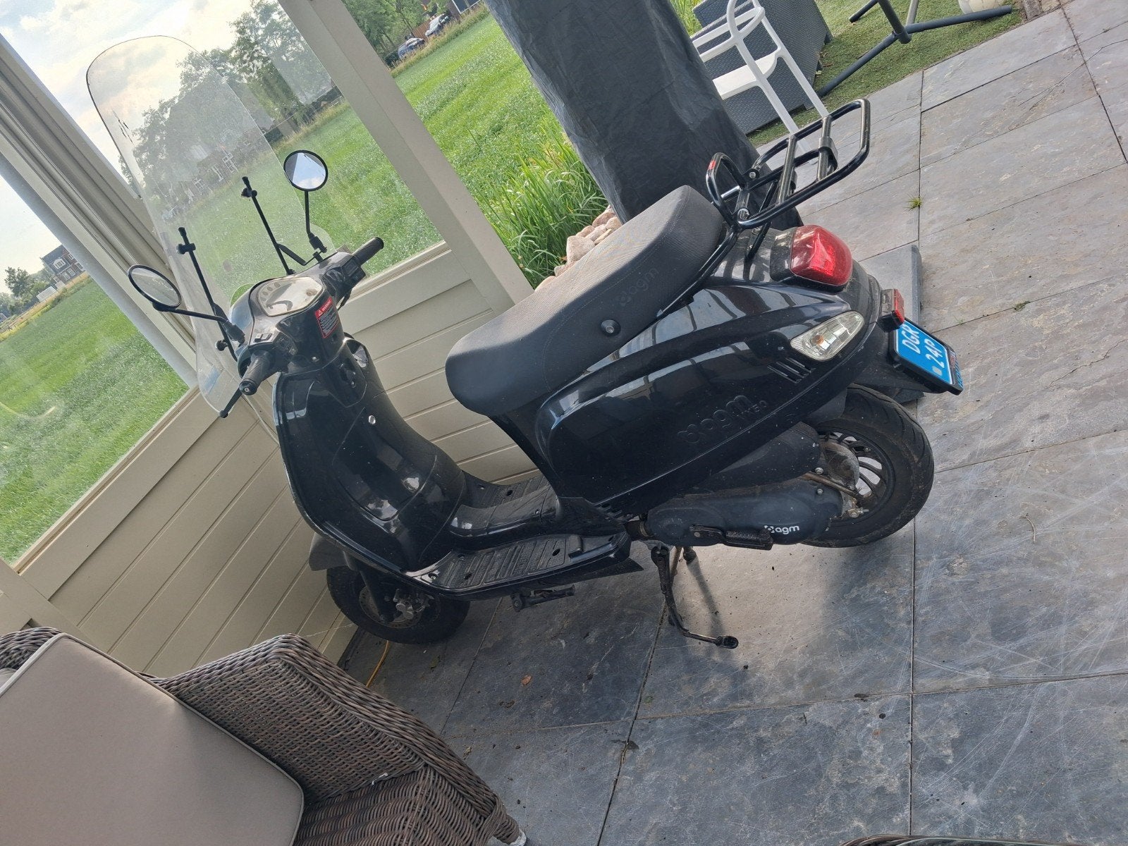 Zwarte AGM scooter met 4724 km op de teller, Ophalen of Verzenden, Gebruikt, Overige typen, Overige merken