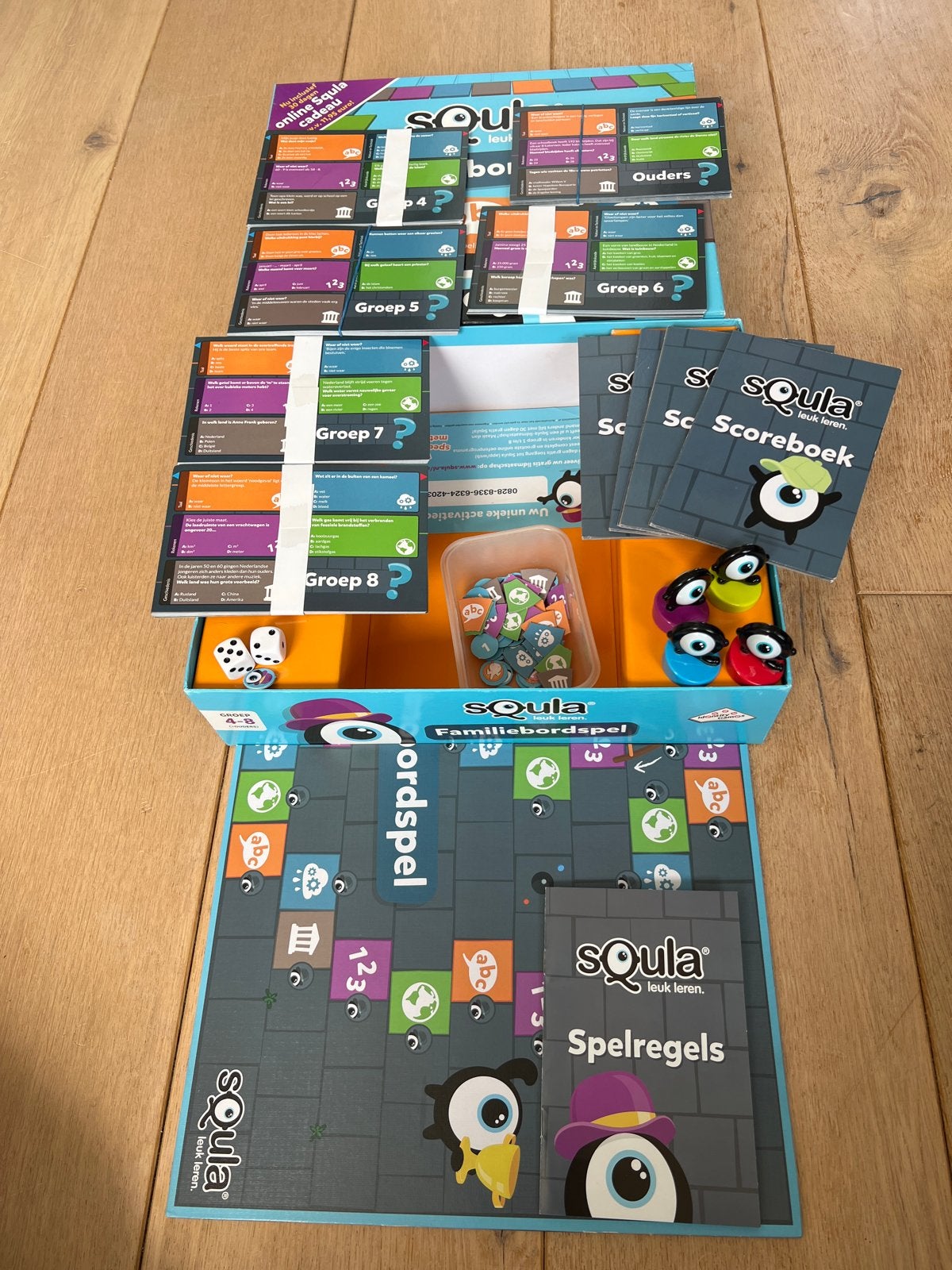 Squla Familiebordspel - Leuk leren voor groep 4-8, Drie of vier spelers, Ophalen of Verzenden, Zo goed als nieuw