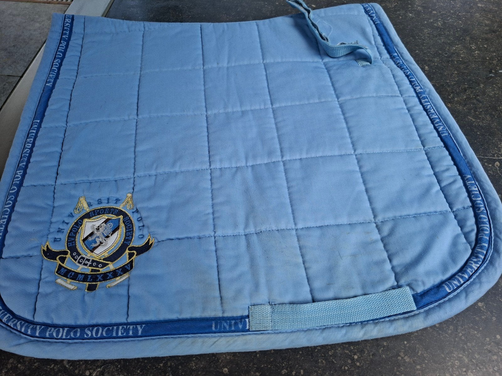Zadeldek University polo, Ophalen, Gebruikt