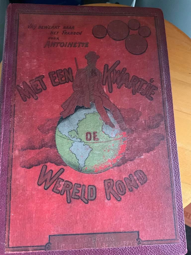 Oud boek met een kwartje de wereld rond. Antoinette, Antiek en Kunst, Ophalen of Verzenden