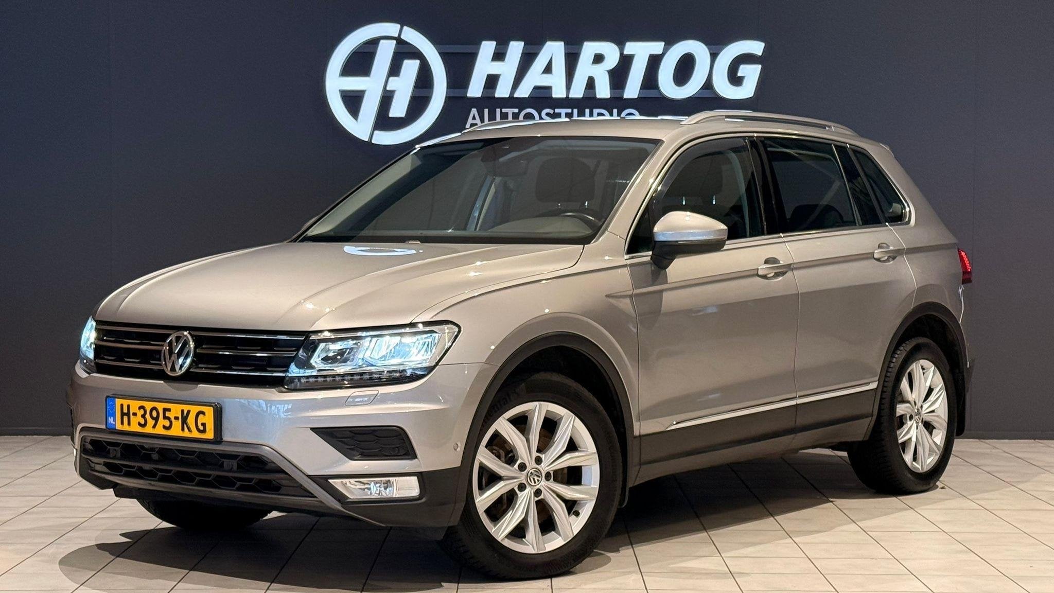 Volkswagen Tiguan 2.0 TSI 4Motion Highline 2000KG trekgewich, Auto's, Stof, Gebruikt, 4 cilinders, 179 pk
