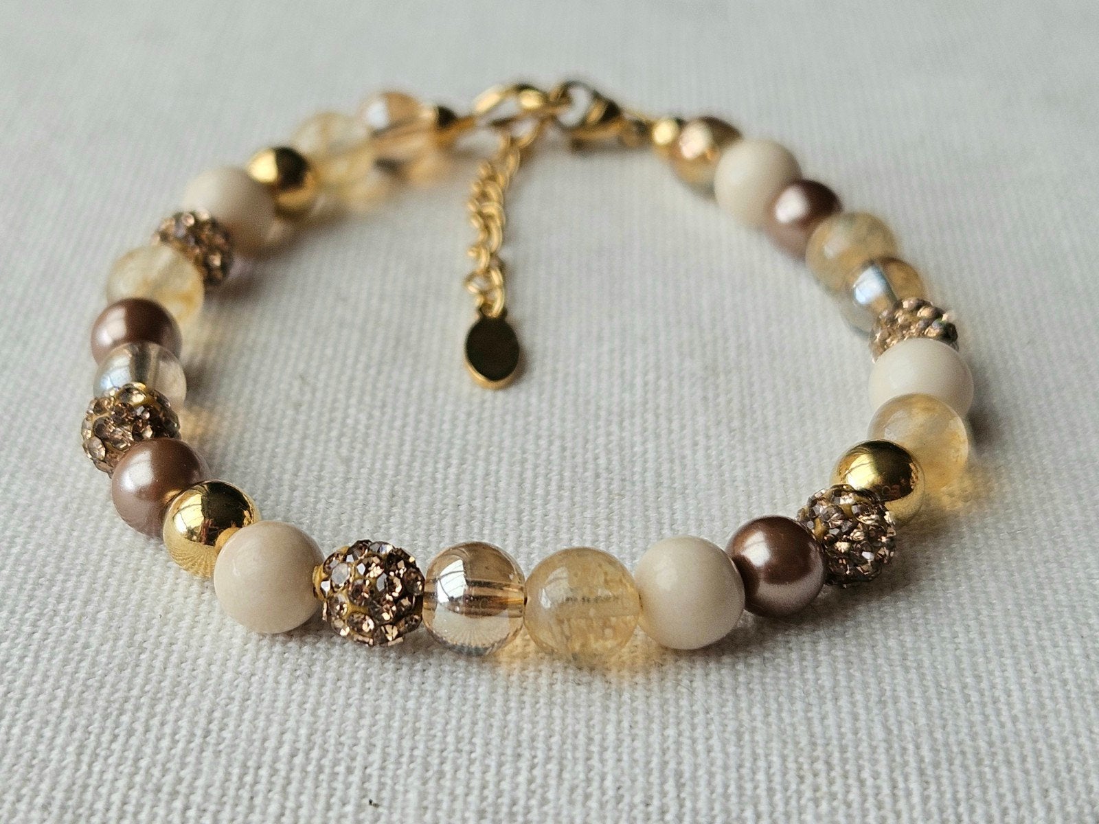 Handgemaakte armband met citrien en ivoor, Sieraden, Tassen en Uiterlijk, Met bedels of kralen, Staal, Nieuw, Ophalen of Verzenden