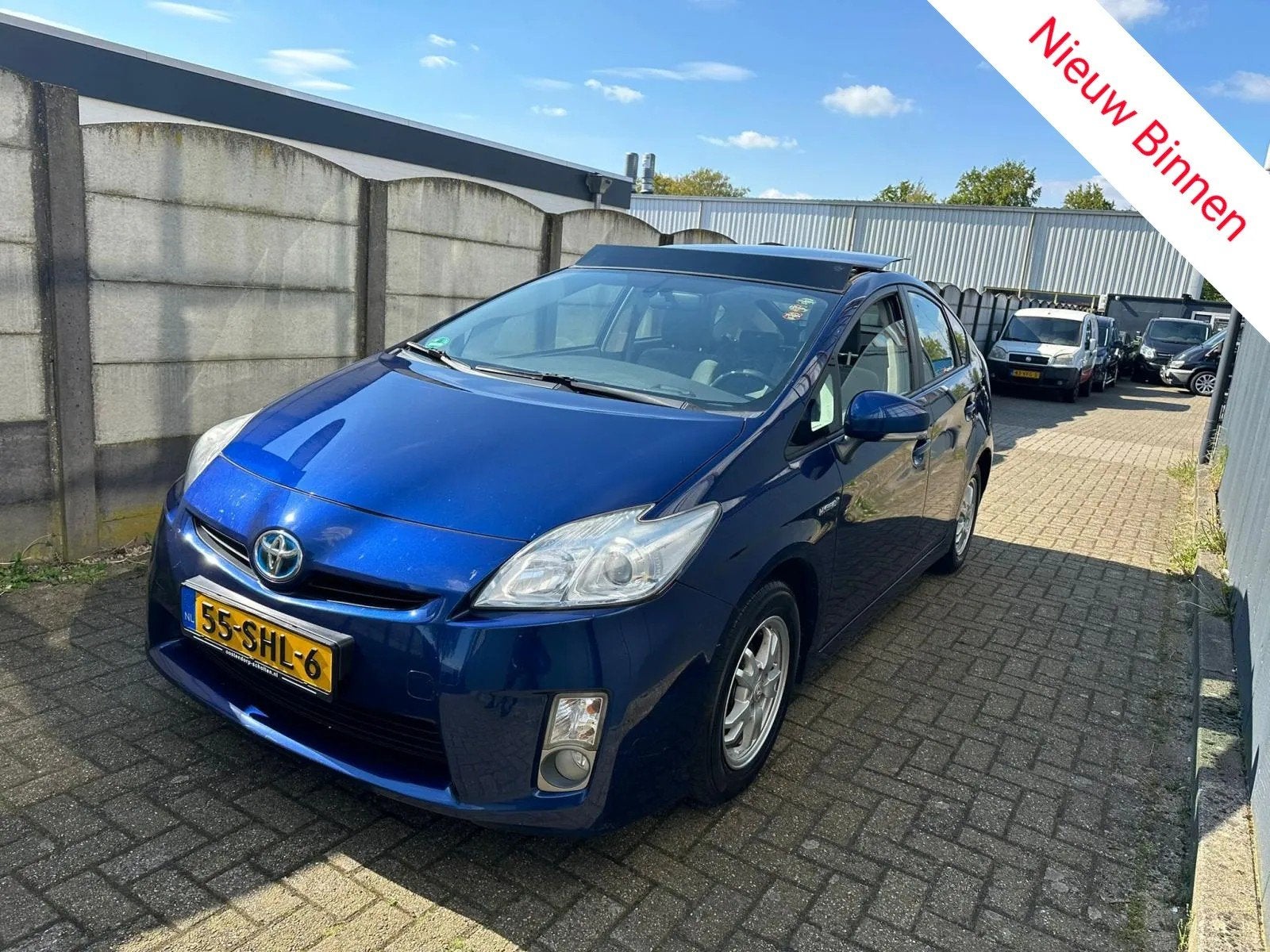 Toyota Prius 1.8 Dynamic PANO/ CLIMA/ SOLAR/ LM VELGEN!, Gebruikt, Zwart, 4 cilinders, Blauw
