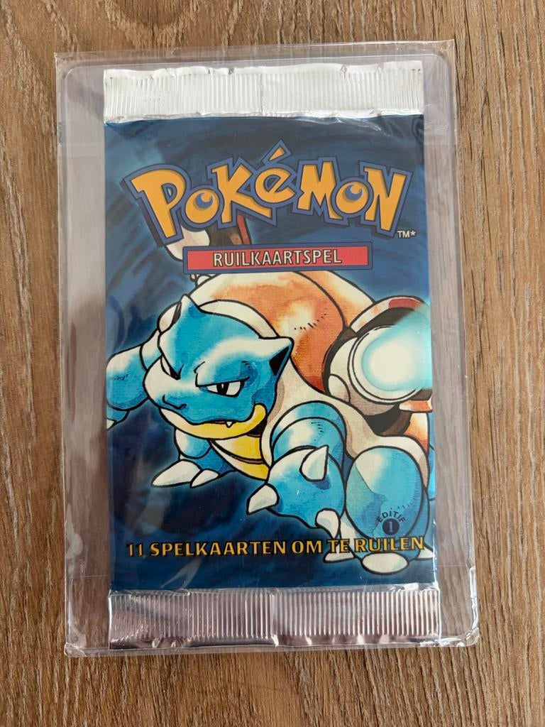 Pokémon Base Set Booster Pack Blastoise 1st Edition NL 21Gr, Ophalen of Verzenden, Zo goed als nieuw, Booster