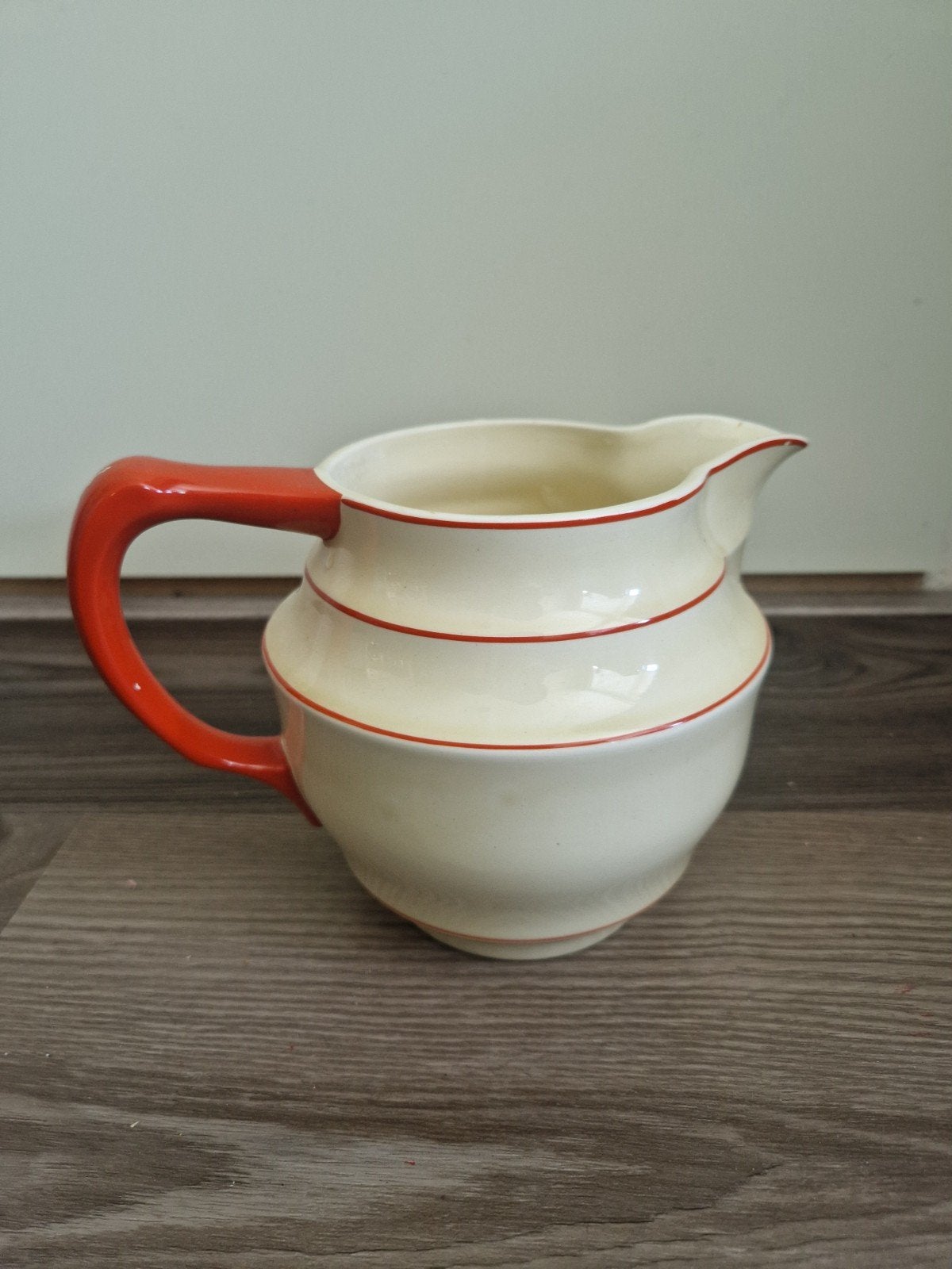 Vintage Crème Kleurige Kan met Oranje Handvat, Antiek en Kunst, Ophalen of Verzenden