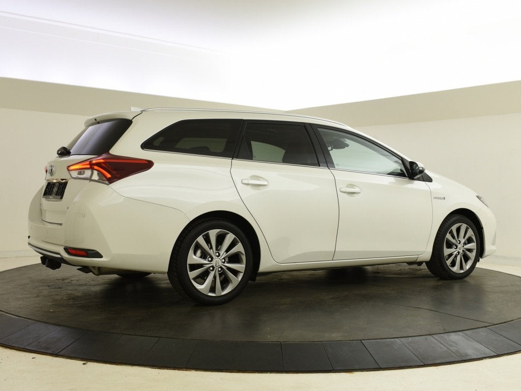 Toyota Auris Touring Sports 1.8 Hybrid Executive | Trekhaak, Auto's, 12 maanden, Gebruikt, Wit, Hybride Elektrisch/Benzine