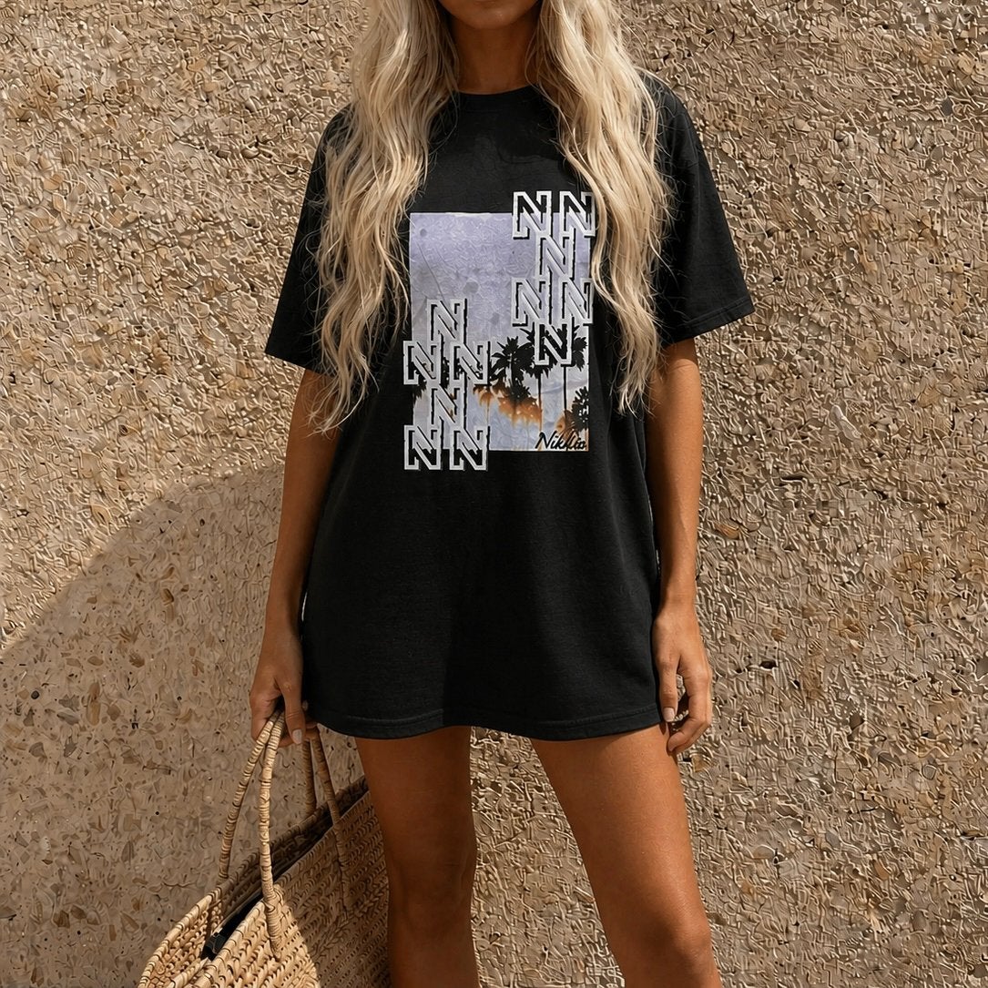 NIKKIE zwart T-shirt jurk met palmboom print, Verzenden, Zwart, Zo goed als nieuw, Maat 36 (S)