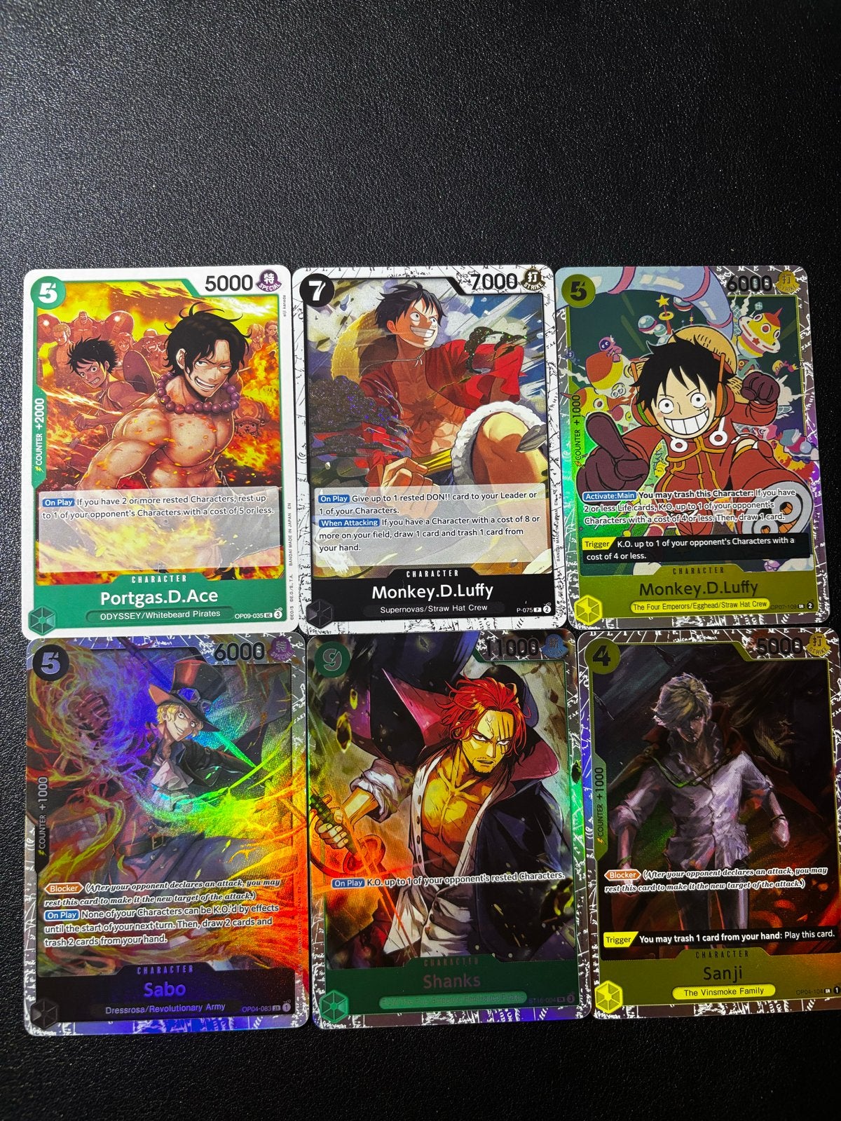 One Piece Kaarten Collectie: Luffy, Ace, Sabo, Shanks, Sanji, Ophalen of Verzenden, Zo goed als nieuw, Meerdere kaarten, Foil