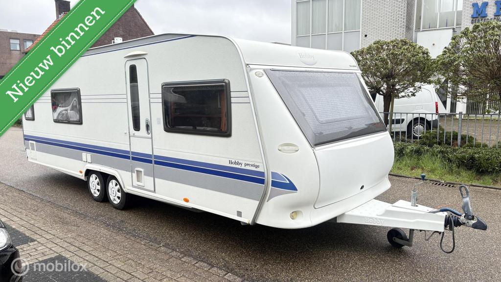 Hobby 650, prestige frans bed, Caravans en Kamperen, Caravans, Hobby, Hobby, Bedrijf, 8 meter en meer