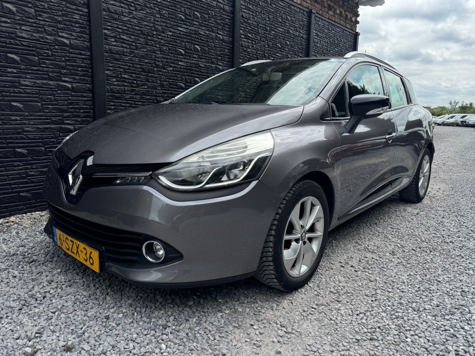 Renault Clio 0.9 TCE 90 Estate 2014 Grijs, Auto's, Voorwielaandrijving, 898 cc, Stof, Zwart