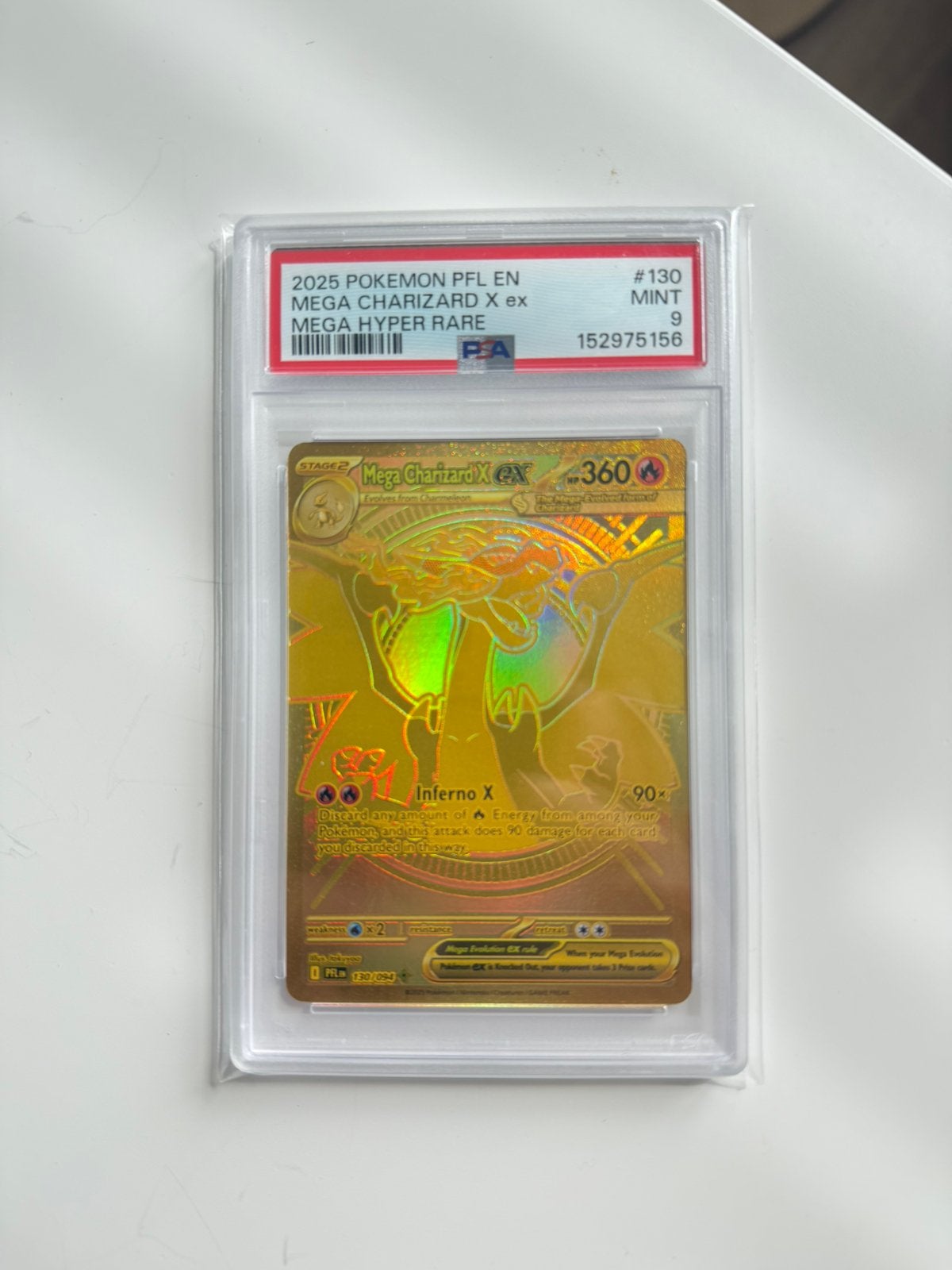 Mega Charizard X PSA 9 (PFL) #130, Hobby en Vrije tijd, Verzamelkaartspellen | Pokémon, Ophalen, Zo goed als nieuw