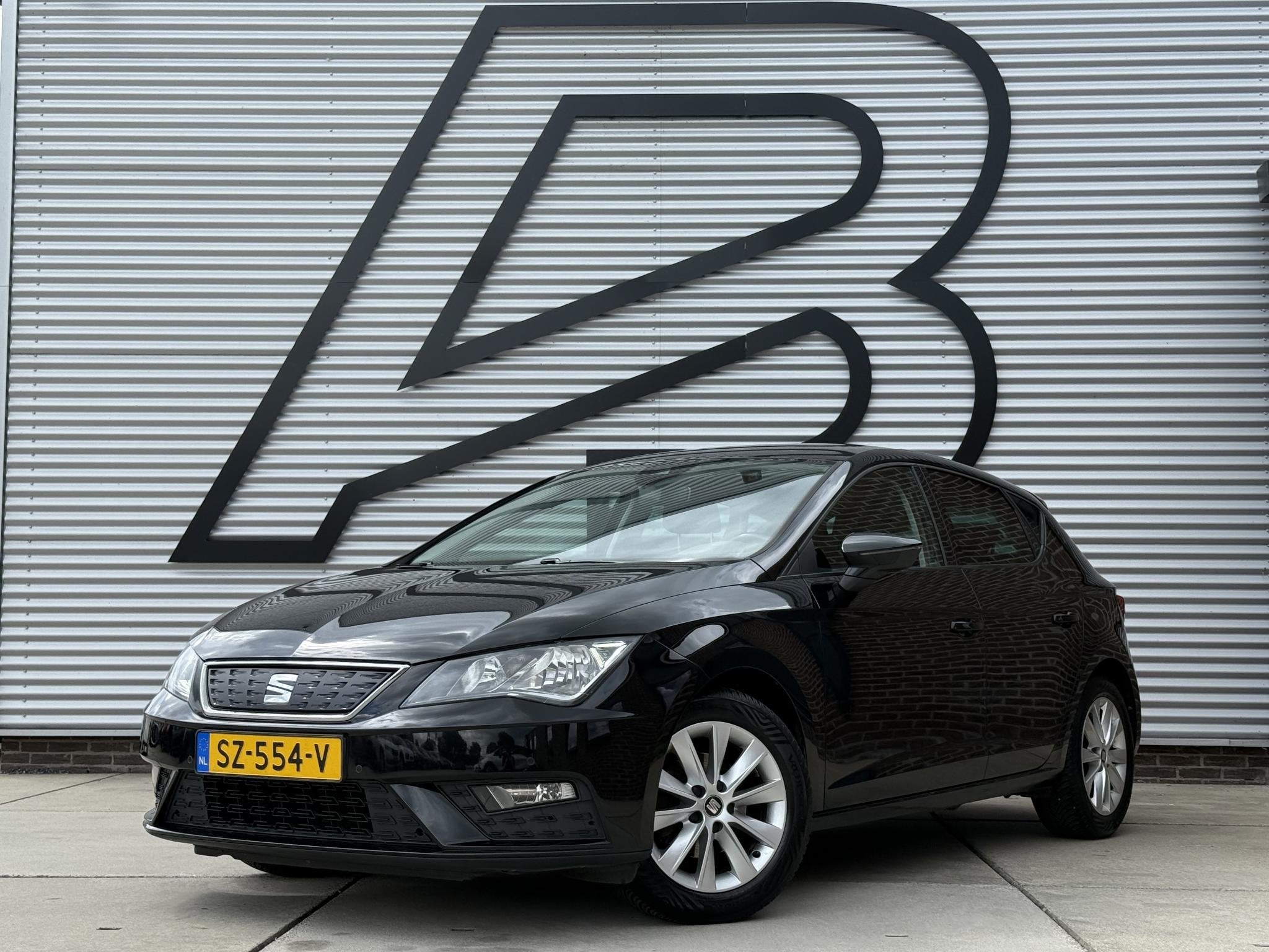 SEAT Leon 1.0 EcoTSI Style Business Intense Navi|PDC V+A|Cli, Auto's, Voorwielaandrijving, Parkeersensor, Stof, Gebruikt