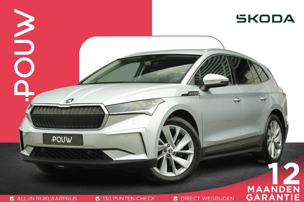 Skoda Enyaq 60 180pk | Stoelverwarming | Trekhaak | Cruise C, Auto's, Automaat, Achterwielaandrijving, Gebruikt, Leder en Stof