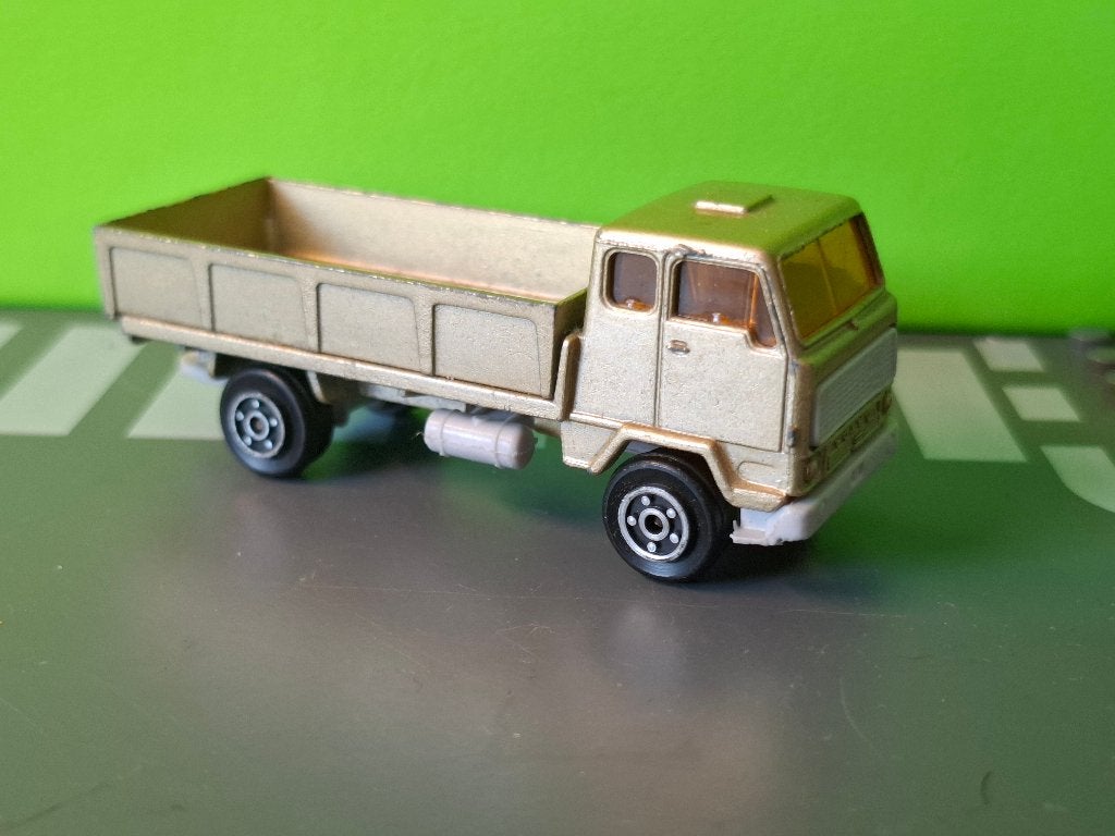 Norev Mini-Jet - Volvo F-89 [goud] 1/87, Ophalen of Verzenden, Gebruikt, Bus of Vrachtwagen, Overige merken