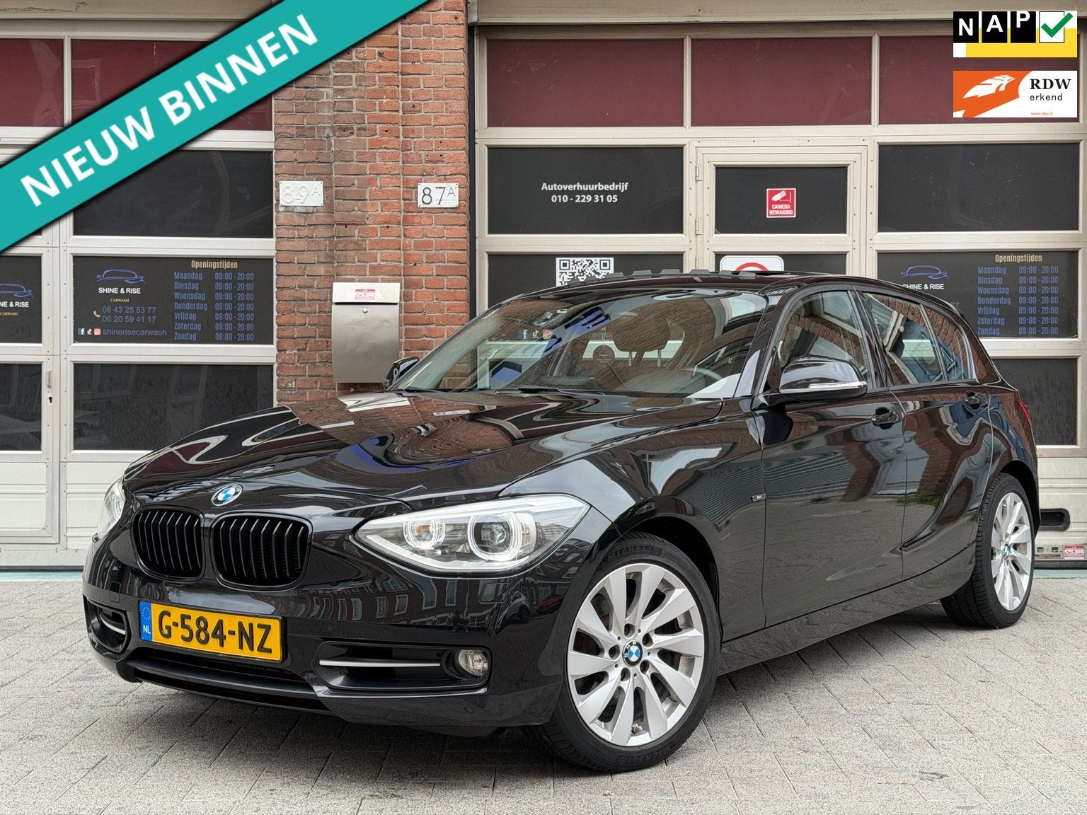 BMW 118i Sport Line | 170PK | Aut | Schuifdak | Xenon, Euro 6, 4 cilinders, 1290 kg, Zwart