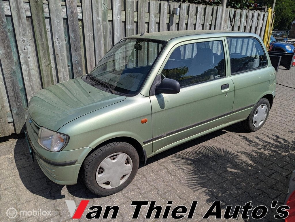 Daihatsu Cuore 1.0-12V DVVT STi, Auto's, Daihatsu, Voorwielaandrijving, Airbags, 18 €/maand, 4 stoelen