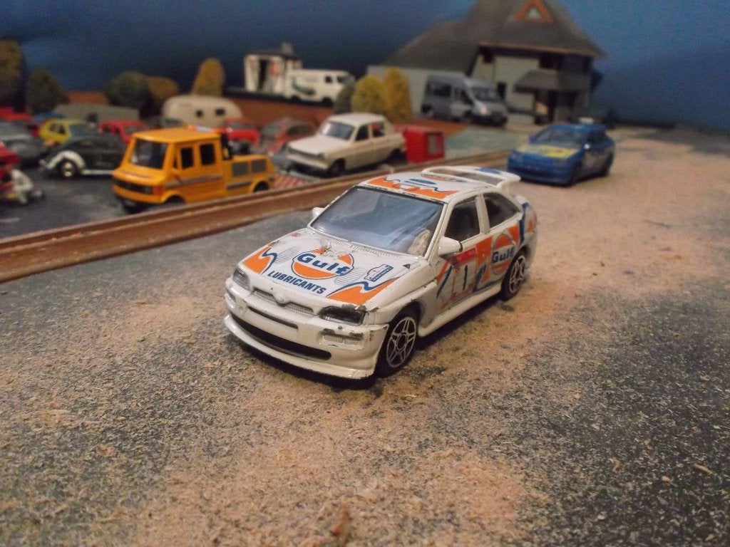 1:43 Escort Cosworth WRC - Bburago Gulf Racing #1, Ophalen of Verzenden, Gebruikt, Auto, Overige merken
