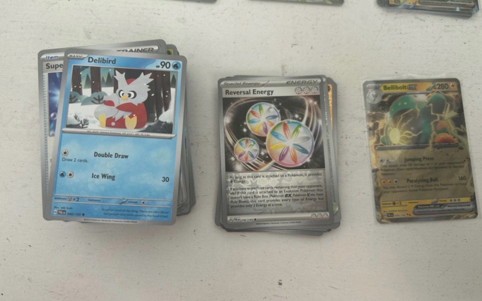 Pokémon eng - paldea evolved normale, reverse + hit, Ophalen of Verzenden, Zo goed als nieuw, Meerdere kaarten