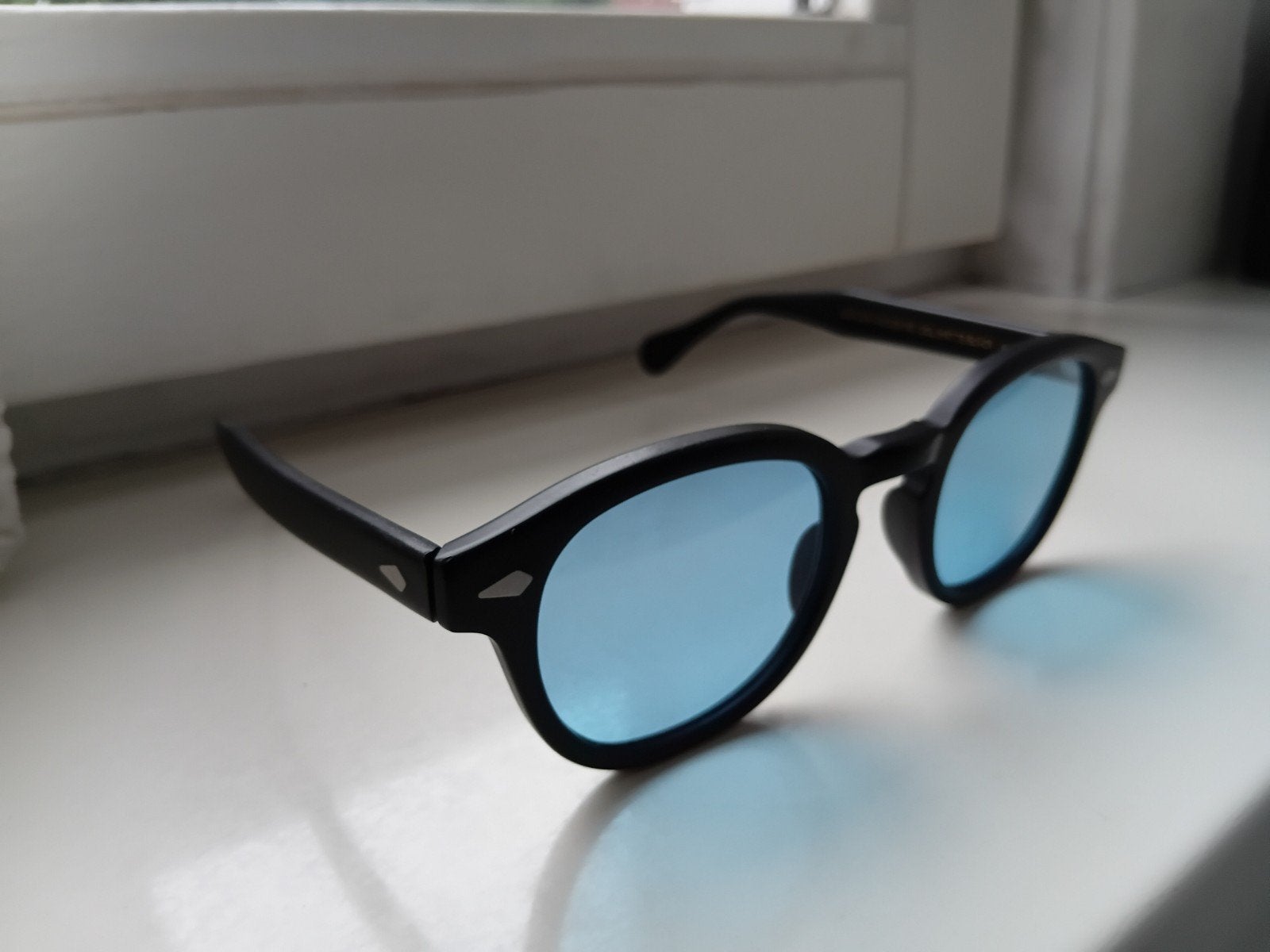 Moscot Originals Lemtosh Zonnebril Mat Zwart Blauwe Glazen, Zonnebril, Zwart, Zo goed als nieuw, Ophalen