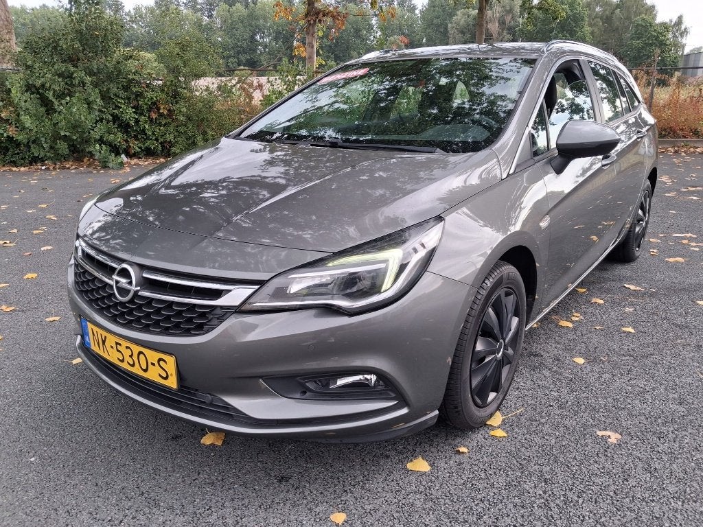NEW MOD Opel Astra 1.0 Turbo 77KW Sports Tourer 2017 Grijs, Auto's, Opel, Stof, Euro 6, 1178 kg, 620 kg