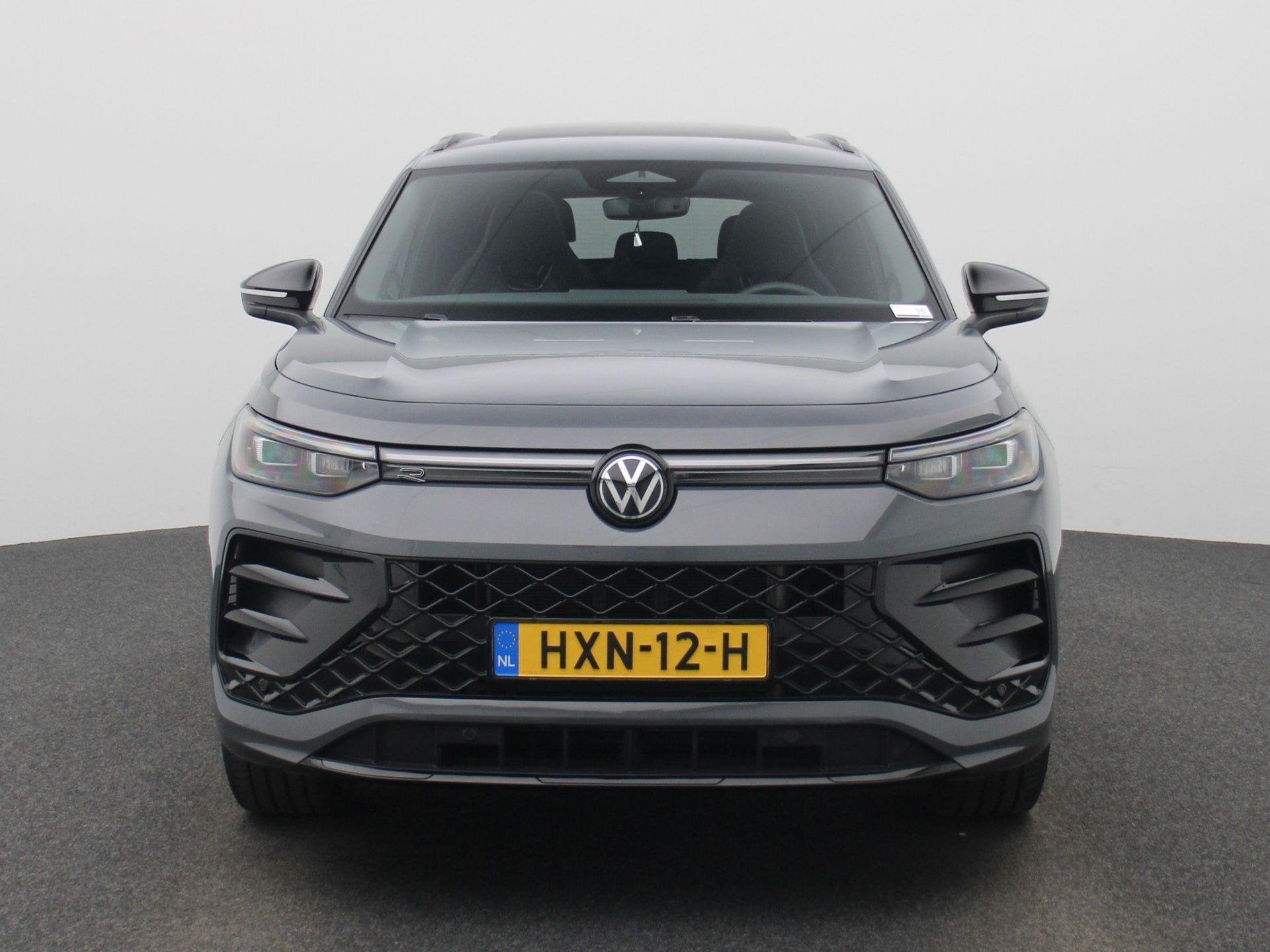 Volkswagen Tayron 1.5 eHybrid R-Line Edition 204 PK| Origine, Auto's, 12 maanden, Stof, 4 cilinders, 150 min
