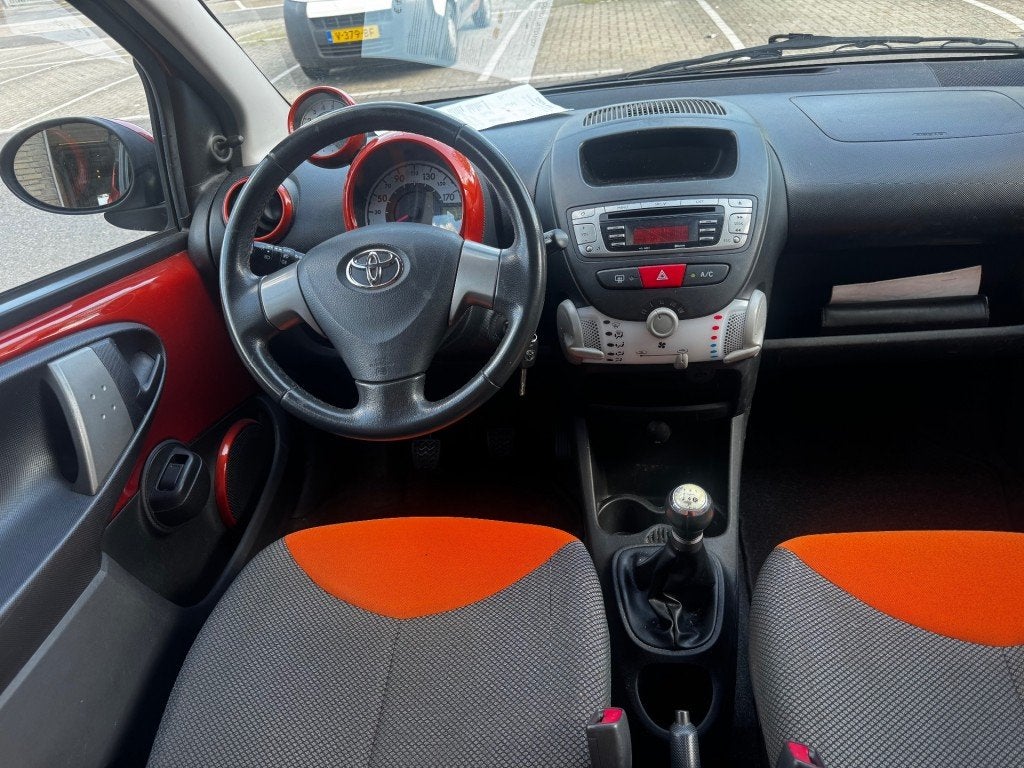 Toyota AYGO 1.0 VVT-i Dynamic Orange AIRCO 5DRS NAP APK BIJ, Voorwielaandrijving, Euro 5, Gebruikt, Overige kleuren