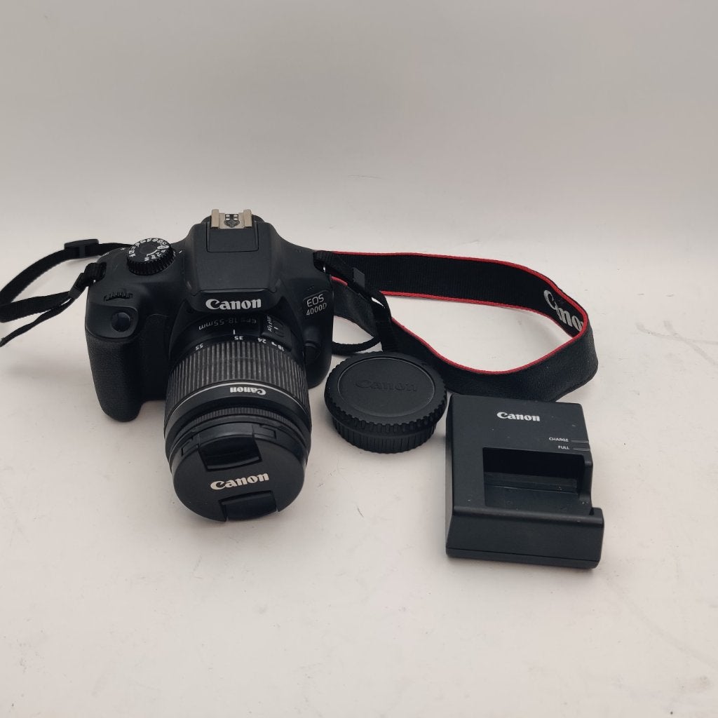 Canon EOS 4000D + 18-55mm Kitlens met accu en lader €289.99, C, Canon, C, Ophalen of Verzenden