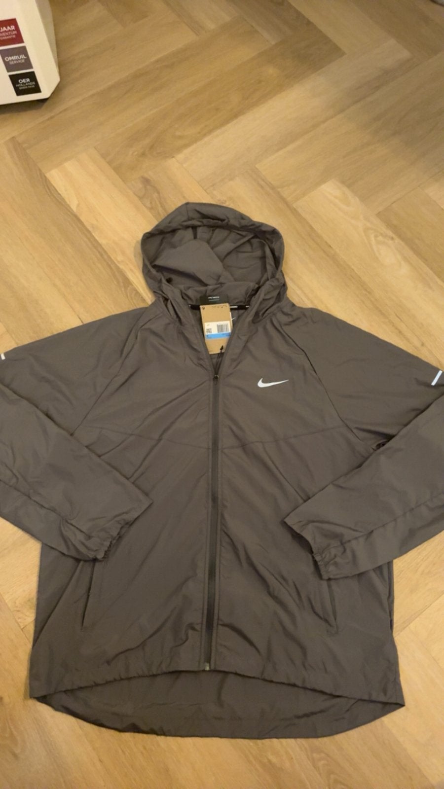Nike miller runner vest, Verzenden, Nieuw, Maat 48/50 (M), Grijs
