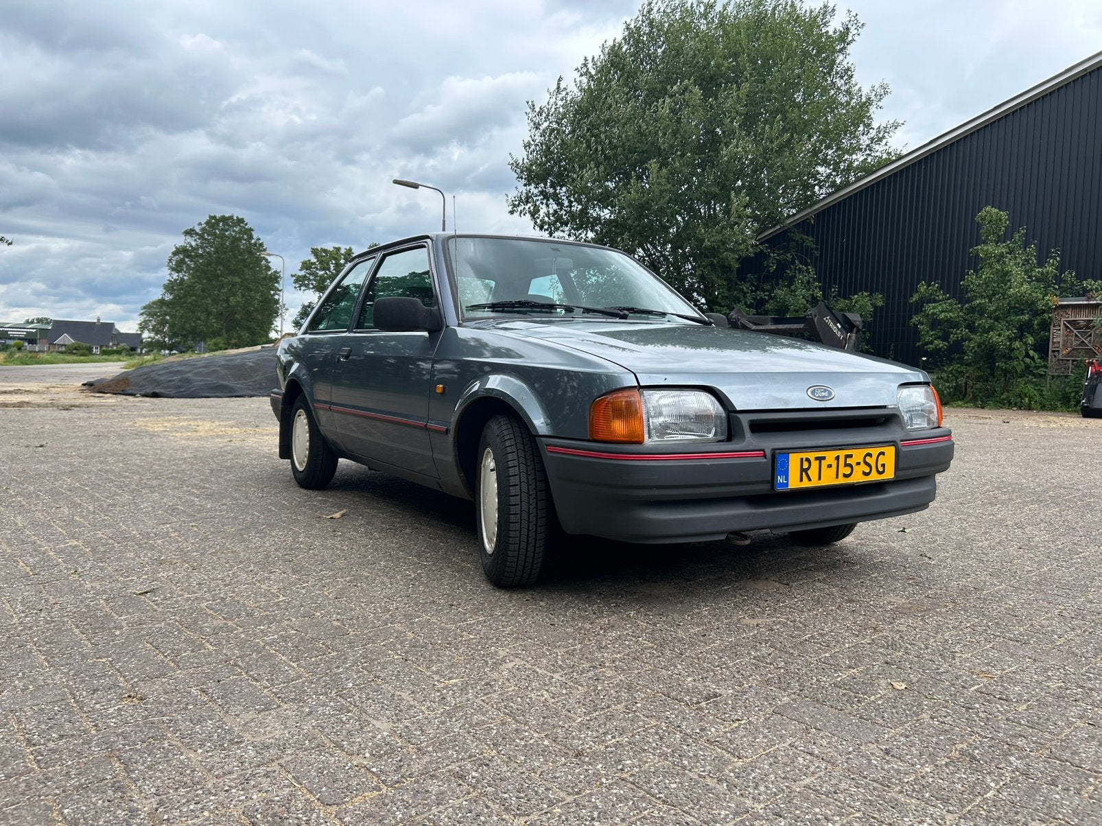 Ford Escort 1.4 CL 1987, Auto's, Ford, Particulier, Escort, Benzine, Hatchback, Handgeschakeld, Origineel Nederlands, Blauw, Beige