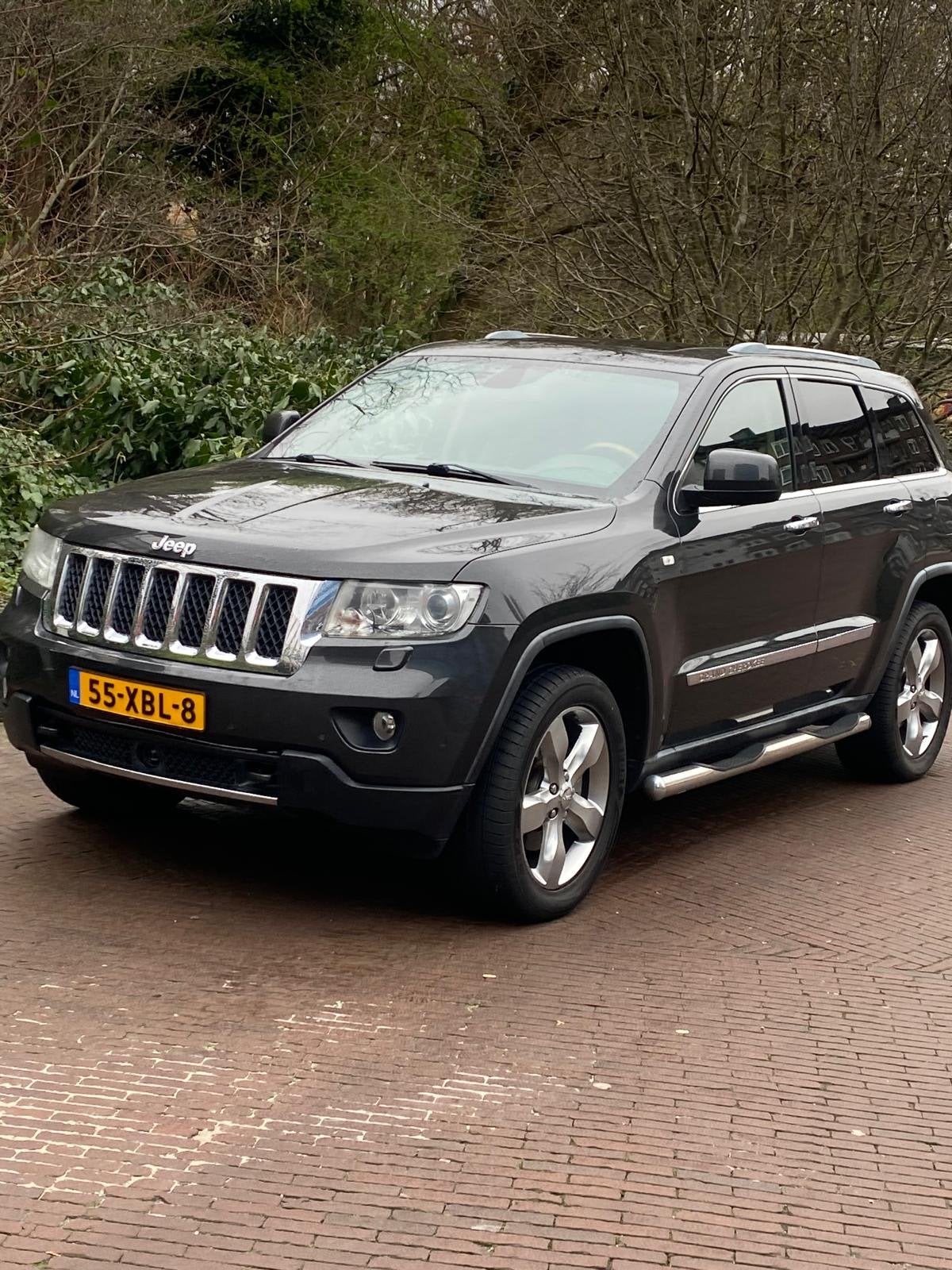 Jeep Grand Cherokee 3.0 CRD 140KW AUT 2011 Grijs, Auto's, Jeep, 190 pk, 3325 kg, 2987 cc, Diesel