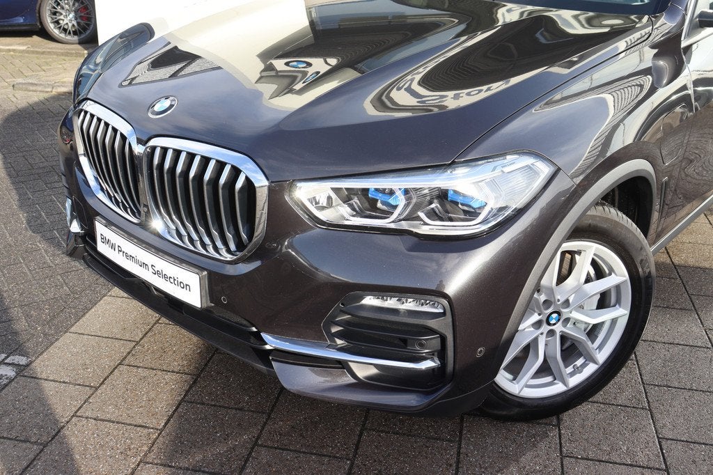 BMW X5 xDrive45e High Executive Automaat / Trekhaak / Laserl, Gebruikt, 394 pk, Met garantie (alle), 97 km