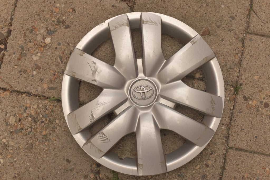 1 losse originele wieldop Toyota Yaris 14 inch (Model 1), Ophalen of Verzenden, Gebruikt